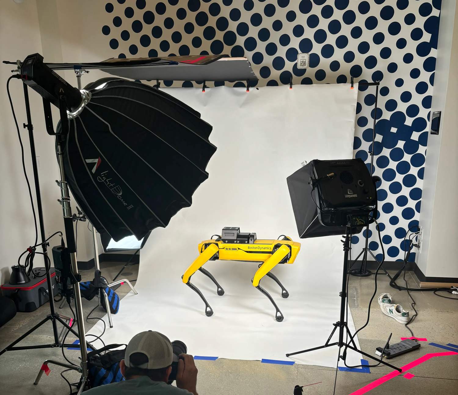 Michael O'Brien on set with a Boston Dynamics Spot robot